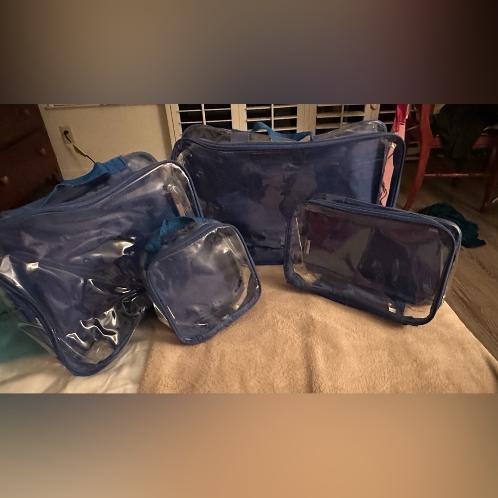 EZPacking.com Blue Transparent Travel Bag Set. $60 new but plenty of use left